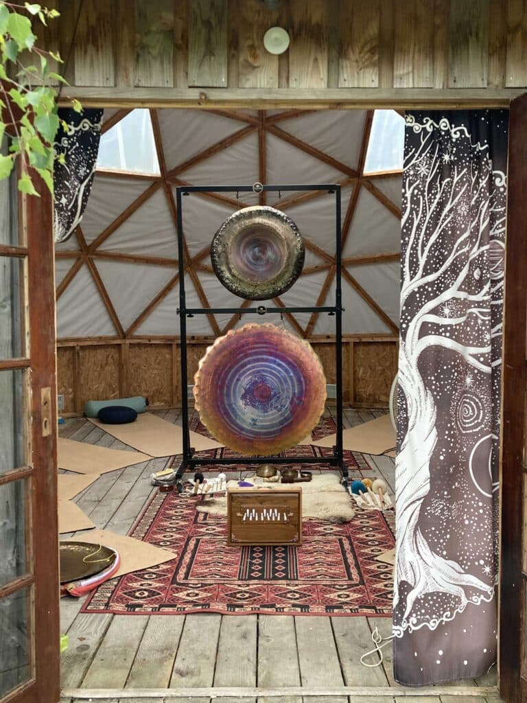 Two of Ashley’s gongs in use as part of a practitioner’s gong bath setup